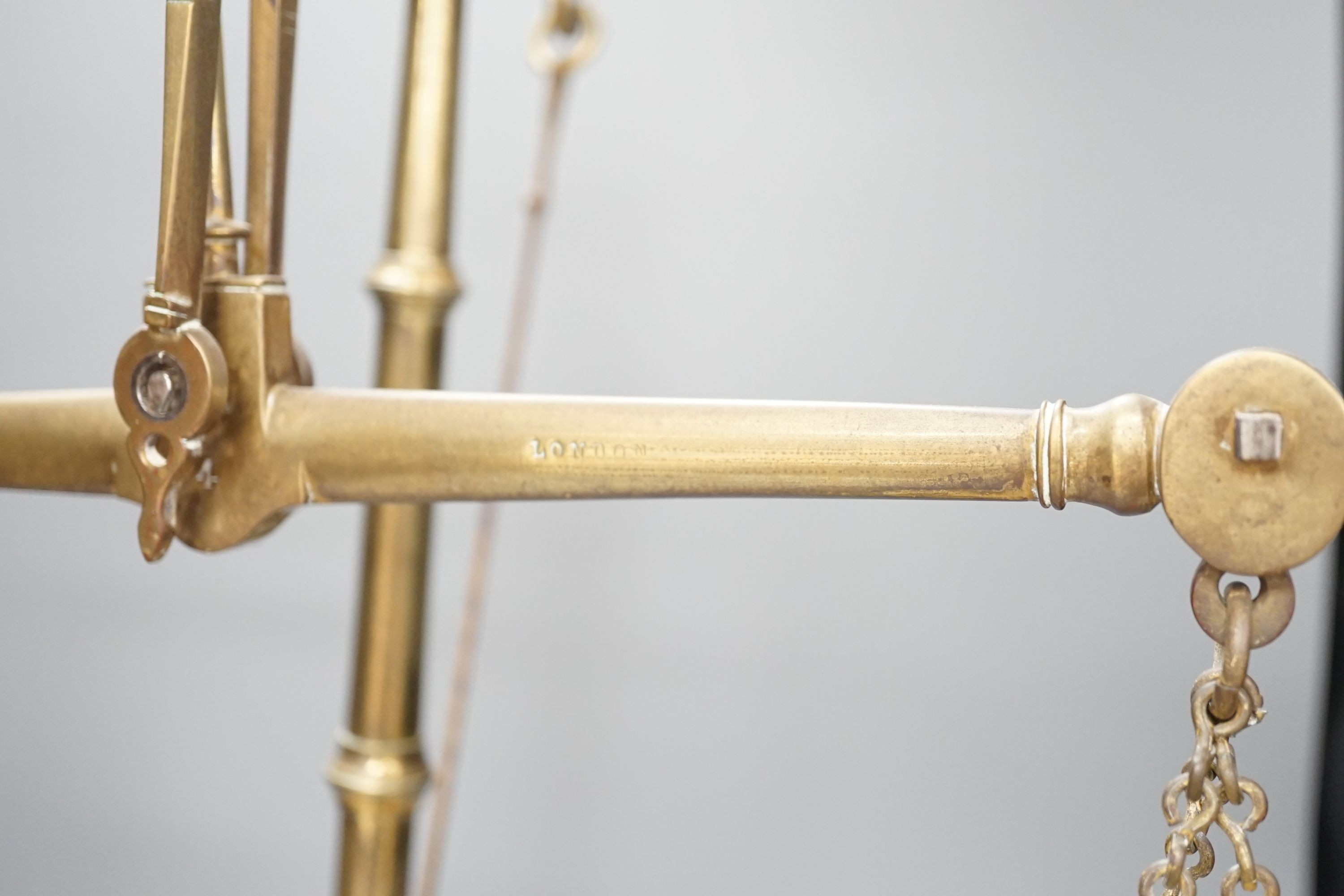 A Doyle & Son, London brass balance scale, 55cm. high